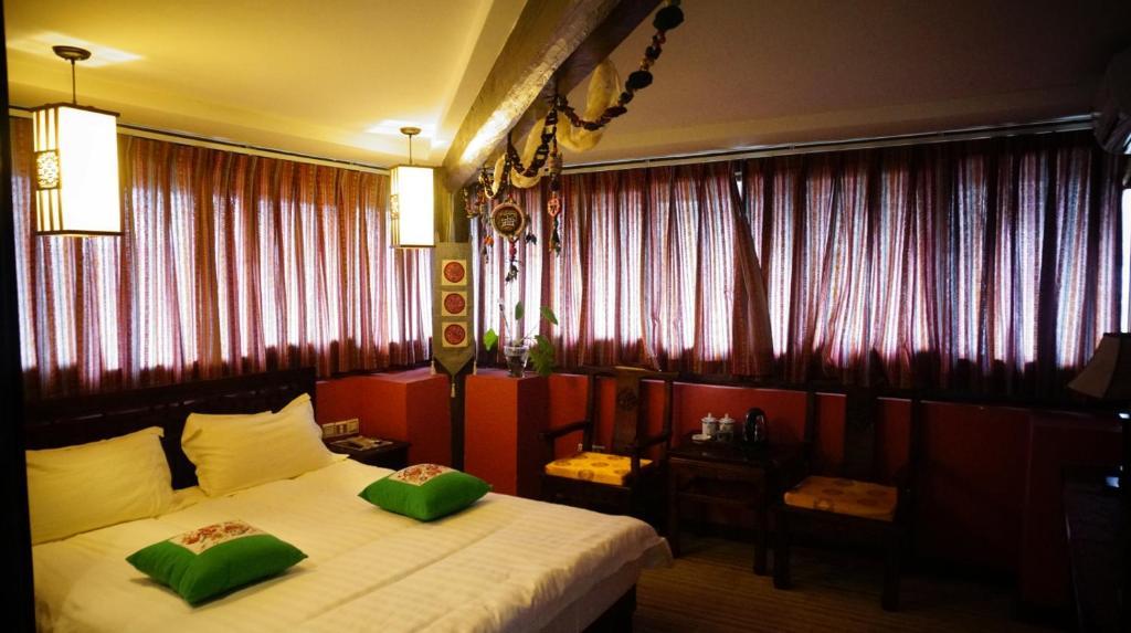 Lijiang Wangjia Courtyard Inn Номер фото